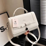 Elegant Bow Charm Top Handle Crossbody Bag